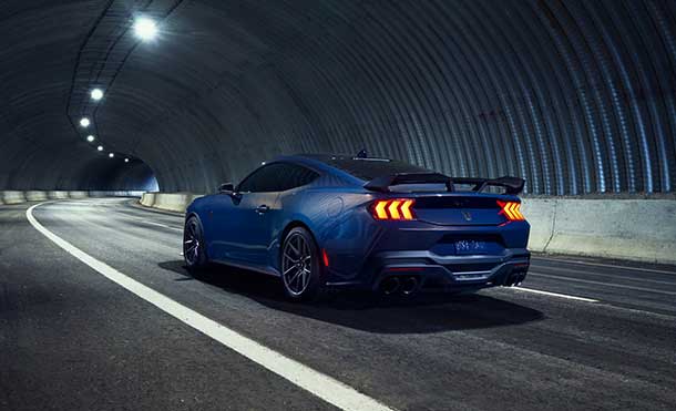 Ford Mustang Dark Horse is equipped with sporty features. It will allow you to drive it on the track.